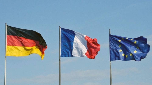 File photo shows the German, French and European Union flags flutter in the wind at the Chancellery in Berlin on April 29, 2019. — courtesy John Macdougall/AFP