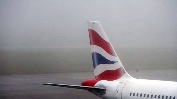 A file photo of the tailfin of a BA airplane on the runway at Heathrow Airport. — courtesy PA Media