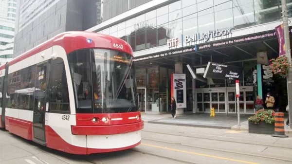 Photo of Toronto streetcar in front of TIFF Building. — courtesy Getty Images