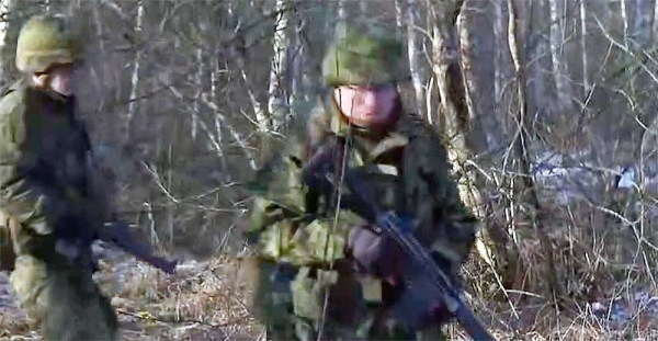 Estonian military reservists attend a training in a countryside near Haapsalu, Estonia, on Friday