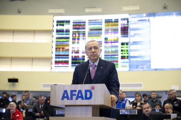 ANKARA, TURKIYE - FEBRUARY 06: Turkish President Recep Tayyip Erdogan speaks to press at Coordination Center of Disaster and Emergency Management Authority (AFAD) after a 7.7 magnitude earthquake hit southern provinces of Turkiye on February 6, 2023 in Ankara, Turkiye. Disaster and Emergency Management Authority (AFAD) of Turkiye said the 7.7 magnitude quake struck at 4.17 a.m. (0117GMT) and was centered in the Pazarcik district in Turkiyeâs southern province of Kahramanmaras. Gaziantep, Sanliurfa, Diyarbakir, Adana, Adiyaman, Malatya, Osmaniye, Hatay, and Kilis provinces are heavily affected by the quake. (Photo by Aytac Unal/Anadolu Agency via Getty Images)