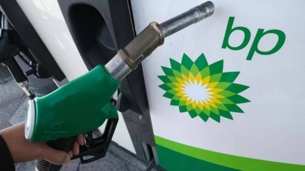 BP scales back climate targets as profits hit record