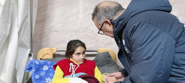 WHO Director General Dr. Tedros Adhanom Ghebreyesus meets Nour who lost her parents in the earthquake in Aleppo, Syria. — courtesy WHO