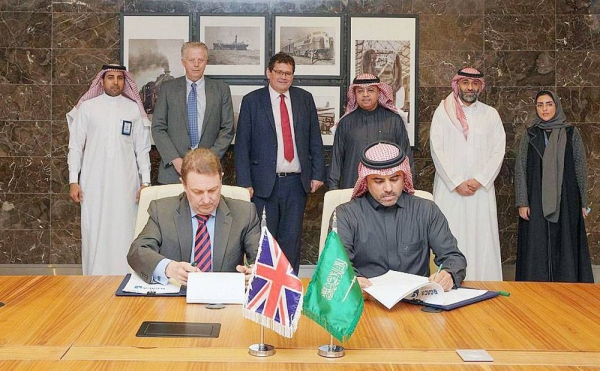 GACA Executive Vice President of Safety and Aviation Standards Capt. Sulaiman Almuhaimedi and Director of the International Group at CAA Ben Alcott sign a deal  on aviation safety, with GACA President Abdulaziz Al-Duailej and UK Ambassador Neil Crompton attending.