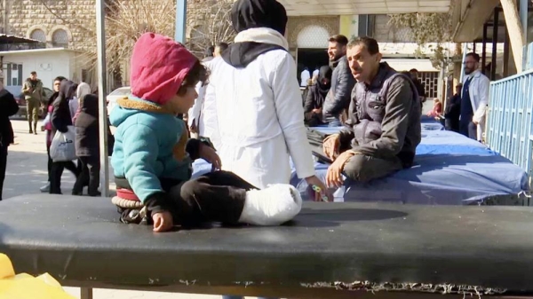 Doctors at Al-Razi Hospital are having to treat patients outside, despite the cold weather.