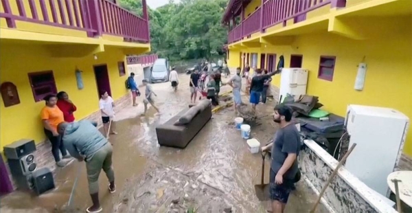 Streets submerged and cars pulled into the earth in Ilhabela, an archipelago off the Brazilian coast.