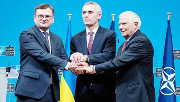 Ukraine Foreign Minister Dmytro Kuleba, left, NATO Secretary General Jens Stoltenberg, center, and EU High Representative for Foreign Affairs Josep Borrell discuss ways to continue supporting Ukraine in Brussels. — courtesy Twitter