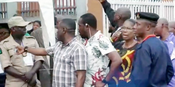 Nigerians queue up to vote in tense elections Saturday.
