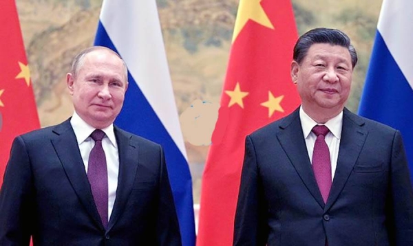 

Chinese President Xi Jinping, right, and Russian President Vladimir Putin pose for a photo prior to their talks in Beijing, China, on Feb. 4, 2022. — courtesy Alexei Druzhinin, Sputnik