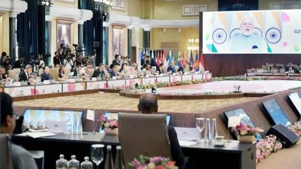 India’s Prime Minister Narendra Modi (on screen) addresses the G20 foreign ministers” meeting in New Delhi on Thursday. — courtesy Reuters