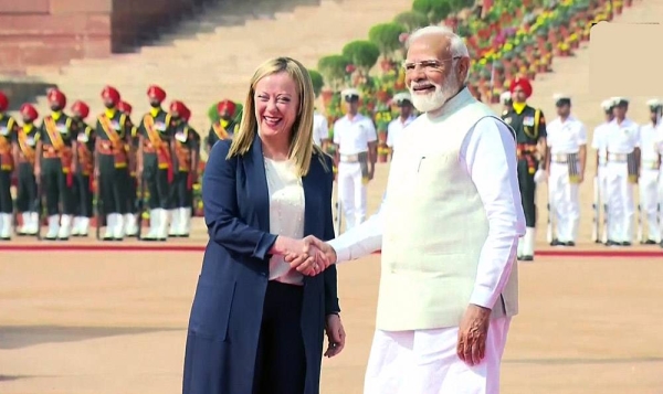 Italian Prime Minister Giorgia Meloni is received by Indian Prime Minister Narendra Modi in New Delhi on Thursday.