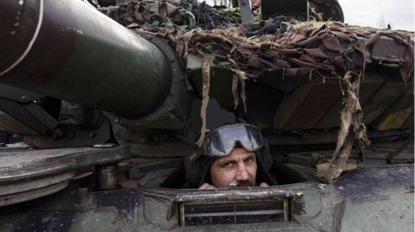 A Ukrainian serviceman sits in a tank at the frontline near Bakhmut, Ukraine, Monday. — courtesy Evgeniy Maloletka