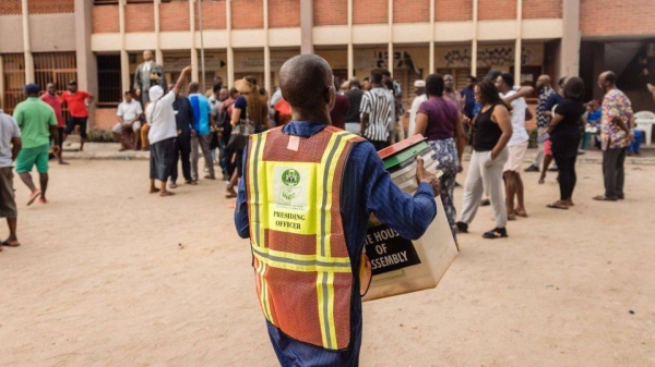 Independent National Electoral Commission (INEC) officials set up voting materials at a polling station in Ojuelegba, Lagos, on February 25, 2023.