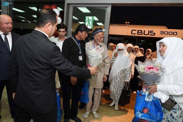 Passengers arriving aboard the Somon Air flight are being received at King Abdulaziz International Airport in Jeddah.