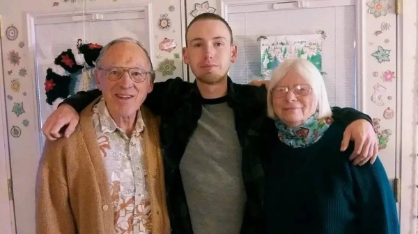 Jerry Jouret (left) with wife Sharon (right) and their grandson Christian (middle)