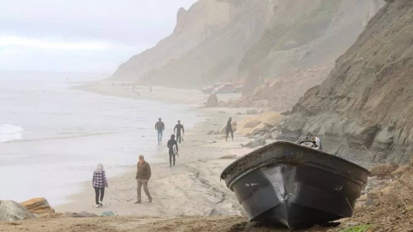 A panga boat sits along the Black's Beach, San Diego, following an apparent migrant smuggling operation.