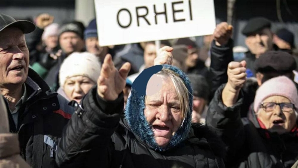 People shout anti-government slogans during a protest in Chisinau, Moldova, Sunday. — courtesy Aurel Obreja/ AP.