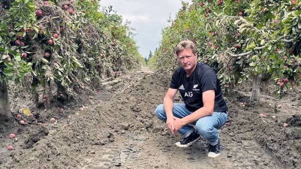 Brydon Nisbet, president of the Hawke’s Bay Fruitgrowers Association on his apple orchard in Puketapu. Brydon’s orchards were covered in mud and silt .— courtesy Brydon Nisbet