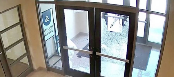 Police released CCTV images showing the shooter gaining entry to the school.