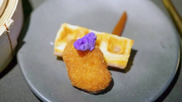 


A nugget made from lab-grown chicken meat is seen during a media presentation in Singapore, the first country to allow the sale of meat created without slaughtering any animals, on Dec. 22, 2020. — courtesy Nicholas Yeo/AFP