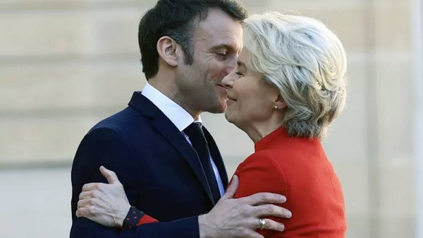 French President Emmanuel Macron hugs European Commission president Ursula van der Leyen as she arrives for a working lunch, Monday, at the Elysee Palace in Paris.— courtesy AP