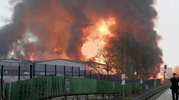 Huge flames rise from a fire in Hamburg, Germany, Sunday.