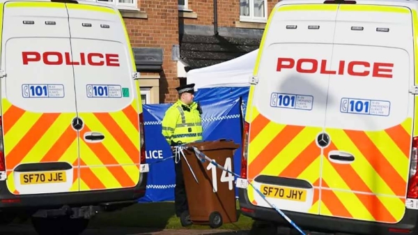 A police officer stands on duty outside the home of Peter Murrell, former chief executive of the Scottish National Party, April 6, 2023. — courtesy AFP