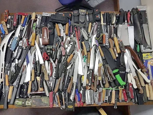 File photo shows a cluster of knives. Stabbing is a big problem in Britain. 
