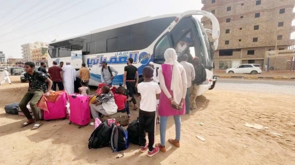 People gather as they flee clashes between the paramilitary RSF and the army in Khartoum. — courtesy Reuters