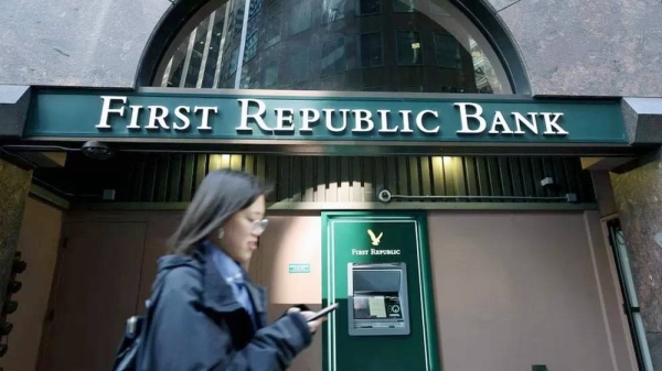 A pedestrian walks by a First Republic Bank office in San Francisco, California. — courtesy Getty Images