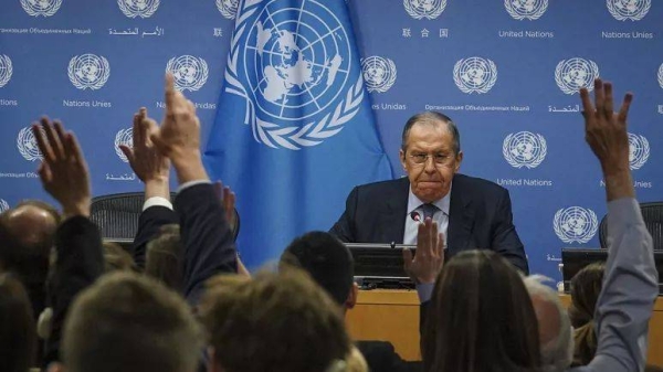 Russia's Foreign Minister Sergey Lavrov watch as reporters raise hands to ask questions during a press conference at the United Nations, Tuesday April 25, 2023 at the UN HQ