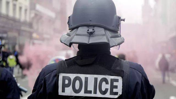Police officer stand during a demonstration in Lille, northern France