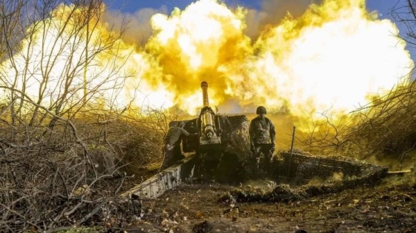 A Ukrainian soldier fires towards Russian positions outside Bakhmut in November