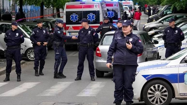 Police block streets around the Vladislav Ribnikar school in Belgrade, Serbia, Wednesday, May 3, 2023.