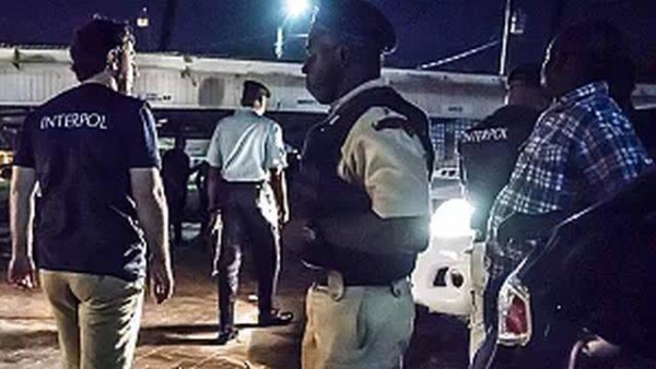 Interpol officers during a raid in night clubs in Georgetown, Guyana, on April 7, 2018