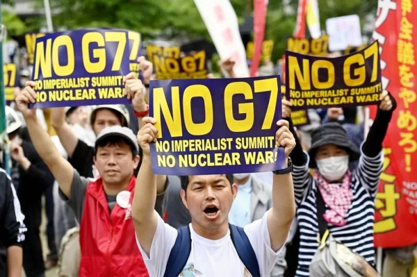 People demonstrate on Friday in Hiroshima city, Japan, as they protest against the G7 Hiroshima Summit. — courtesy Getty Images