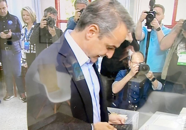 Greek Prime Minister and New Democracy conservative party leader Kyriakos Mitsotakis casts his ballot in Sunday's elections.