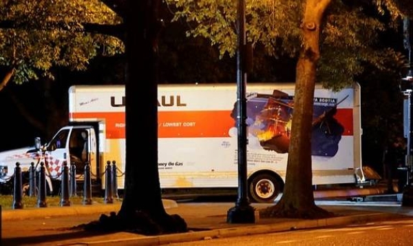 The truck driver was detained after he crashed into security barriers near White House