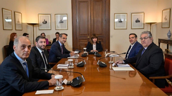 Greece's three main party leaders, pictured at the Presidential Palace in Athens on Wednesday, will run in second round of elections after they refused to form a coalition government
