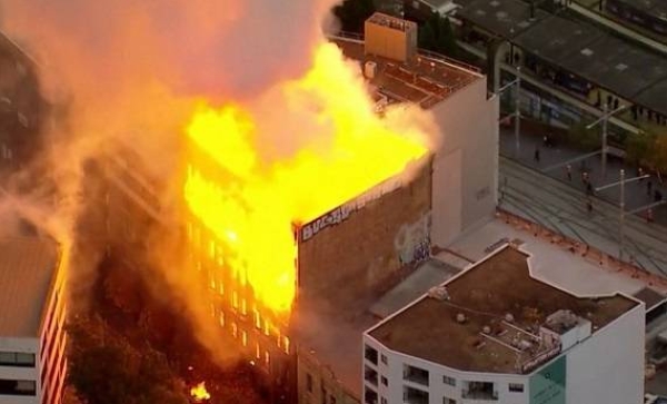 Walls collapse as fireball engulfs Sydney building