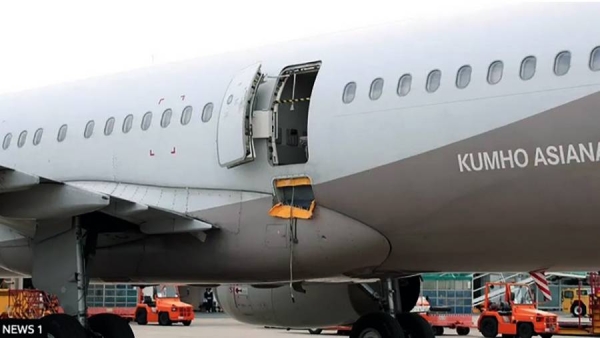 The Asiana Airlines plane landed safely in South Korea after a passenger forced open an emergency door. — courtesy News 1