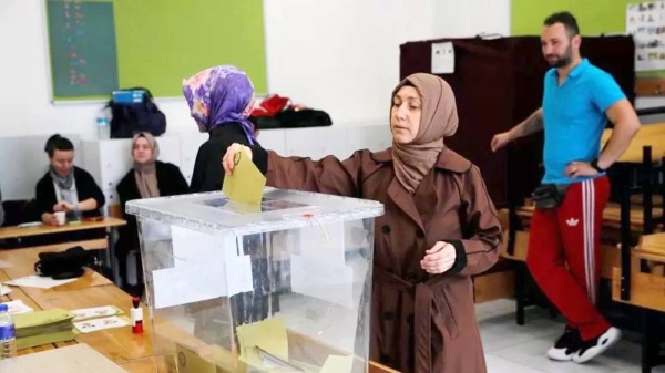 A person votes during the second round of the presidential election, in Istanbul, Turkey Sunday. — courtesy Reuters