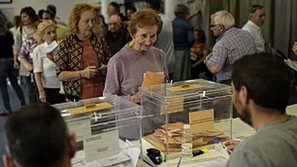 Spaniards casting their vote during regional elections, in Olite, northern Spain