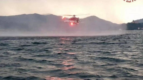 Italy's fire service shared a photo of a helicopter taking part in the rescue