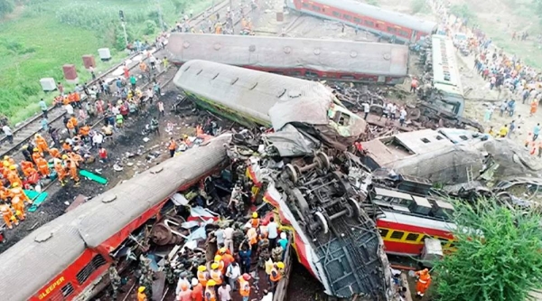 India’s railway minister has suggested a signal fault led to the Odisha rail disaster, with a “change in electronic interlocking” the likely cause.