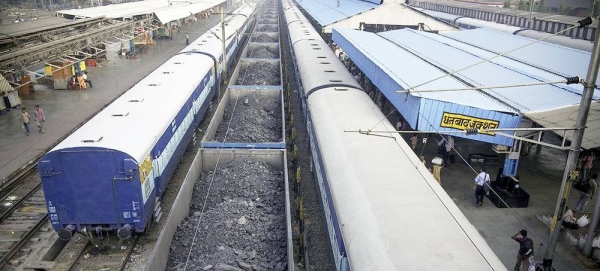 Passenger trains wait for people to board at the Dhanbad Junction railway station in Jharkhand, northern India. One of the busiest in the region, millions of people pass through this station every year. — courtesy ESCAP Photo/Christian Dohrmann