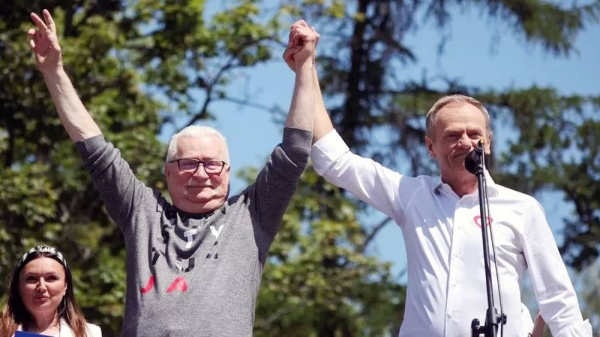 The protest was attended by former President Lech Walesa (left) and former Prime Minister Donald Tusk (right). — courtesy Reuters