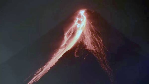 Lava flows from the crater of Mayon volcano in the Philippines. — courtesy EPA