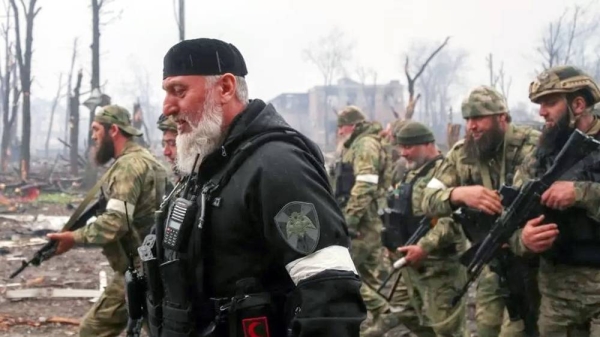 Fighters of the Chechen special forces unit, led by Russia’s State Duma member Adam Delimkhanov, walk near the administration building of Azovstal Iron and Steel Works during Ukraine-Russia conflict in the southern port city of Mariupol, Ukraine on April 21, 2022. — courtesy Reuters