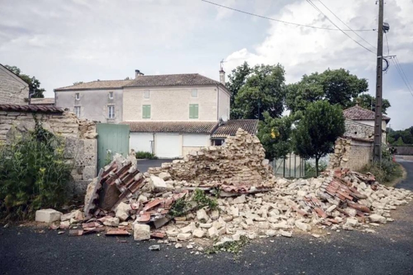 In the town of La Laigne, many homes were left cracked with stones and tiles on the ground. — courtesy Twitter/ Thibaud Moritz
